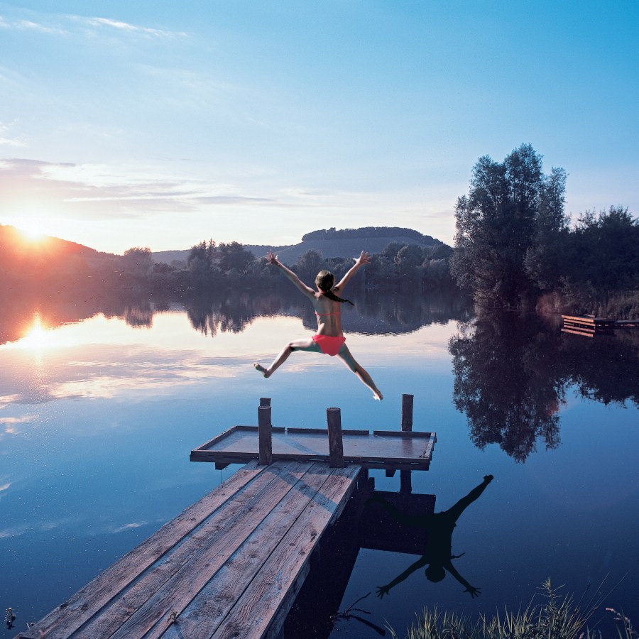 Jumping off dock into water